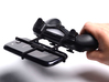 Controller mount for PS4 & Samsung Galaxy S5 3d printed In hand - A Samsung Galaxy S3 and a black PS4 controller