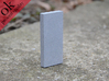 monolith 1*4*9 3d printed in polished alumide, placed outside to attract little animals
